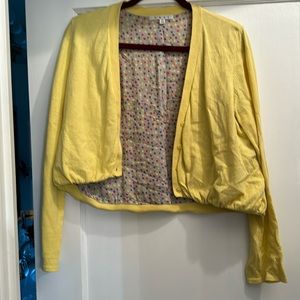 Cotton short sweater gathered at the bottom